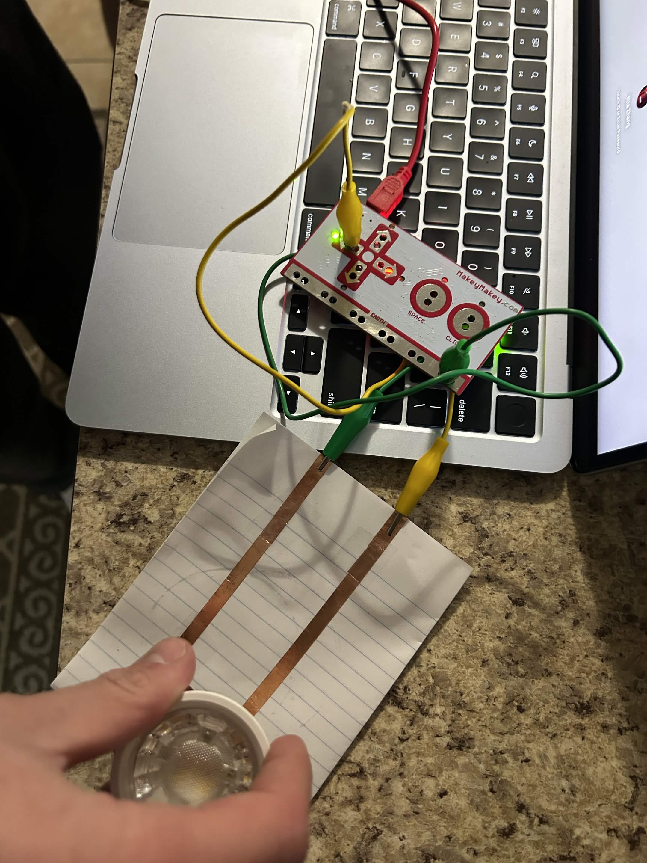 I closed the circuit with a light bulb.