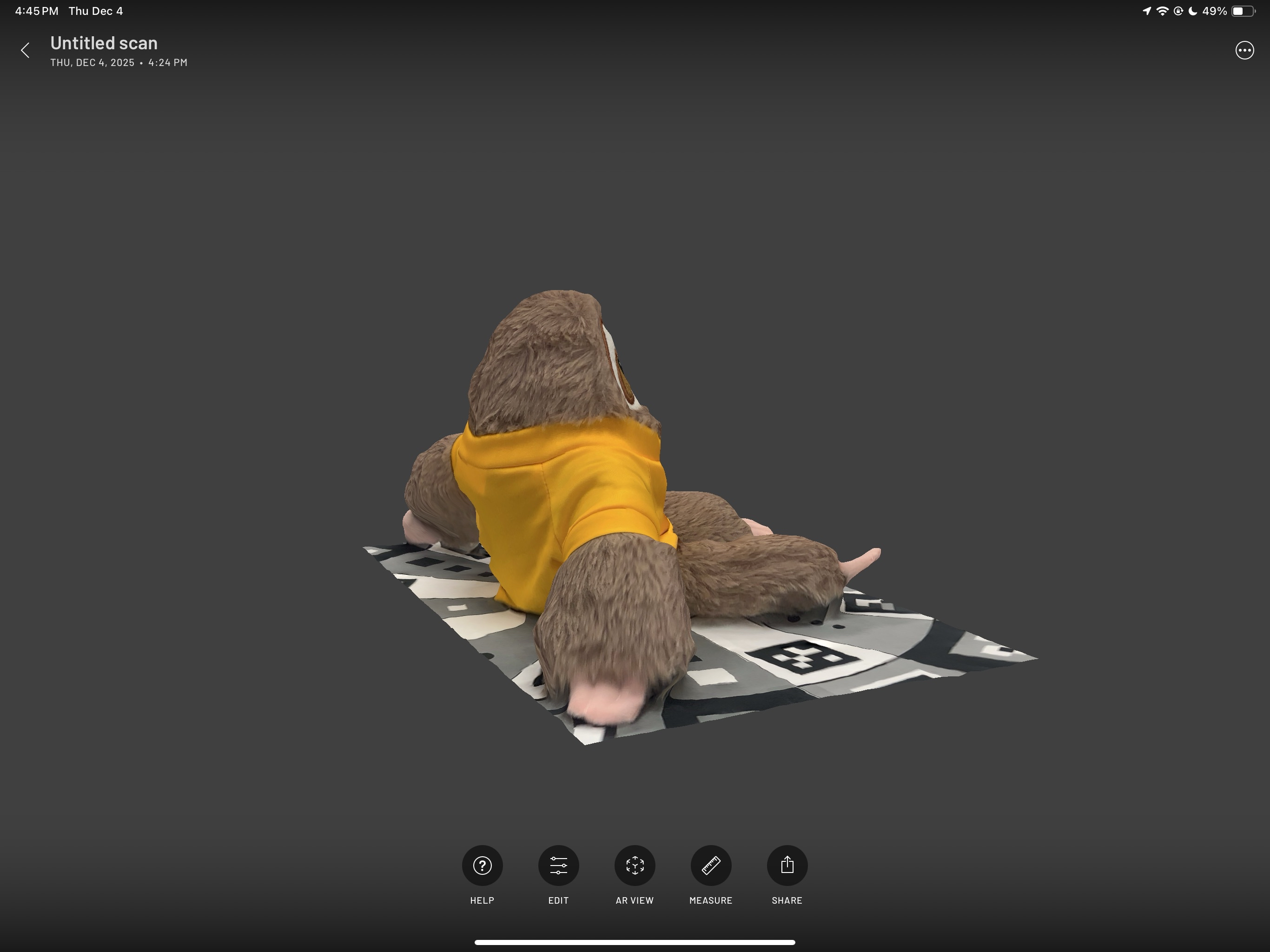 This is the side/back view of my sloth plushie.