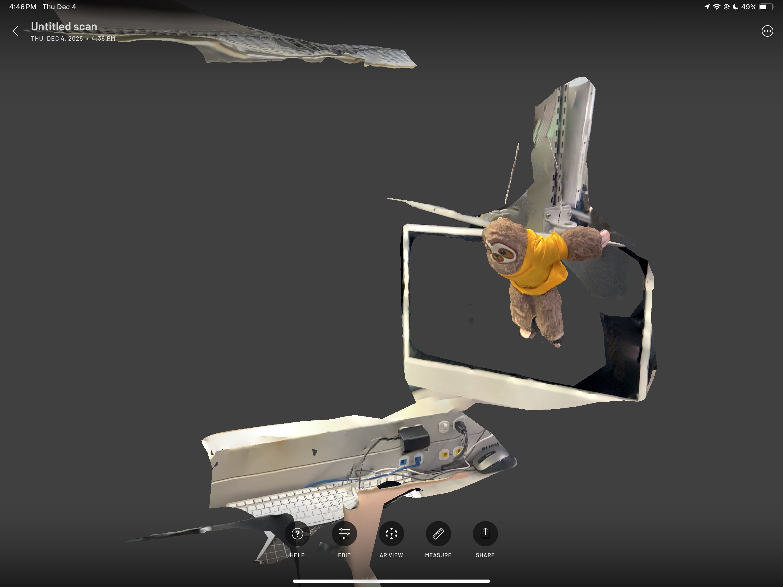 I decided to try hanging my sloth plushie, this is before I cropped the photo.